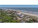 Beachfront property with a pier in the distance, close to shopping and activities at 216 W Arctic Ave # 9, Folly Beach, SC 29439