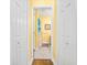 Ensuite bathroom featuring a walk-in shower, vanity, and modern fixtures at 216 W Arctic Ave # 9, Folly Beach, SC 29439
