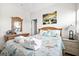 Comfortable bedroom with nautical theme, dresser with mirror, and ample lighting at 216 W Arctic Ave # 9, Folly Beach, SC 29439