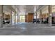 Spacious covered parking area with assigned parking spaces, steel beams and columns, and wood-paneled walls at 216 W Arctic Ave # 9, Folly Beach, SC 29439