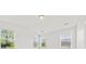 Bright bedroom with vaulted ceilings, neutral walls, and multiple windows at 2200 Hamlin Sound Cir, Mount Pleasant, SC 29466