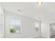 Spacious bedroom with vaulted ceilings, light walls, and natural light from the windows at 2200 Hamlin Sound Cir, Mount Pleasant, SC 29466