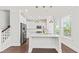 This modern kitchen features a large island, stainless steel appliances, and stylish pendant lighting at 2200 Hamlin Sound Cir, Mount Pleasant, SC 29466