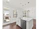 Bright kitchen featuring stainless steel appliances, a kitchen island, and hardwood floors at 2200 Hamlin Sound Cir, Mount Pleasant, SC 29466