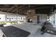 Outdoor community pavilion with a brick fireplace, exposed beams, and picnic tables at 2200 Hamlin Sound Cir, Mount Pleasant, SC 29466