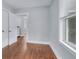Bright bedroom featuring hardwood floors, neutral paint, and modern lighting at 2350 Kent Ave, North Charleston, SC 29405