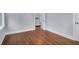 Clean bedroom featuring hardwood floors and neutral paint throughout at 2350 Kent Ave, North Charleston, SC 29405