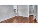 Cozy bedroom with hardwood floors and bright natural light at 2350 Kent Ave, North Charleston, SC 29405