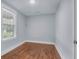 Bright and cozy bedroom featuring hardwood floors, neutral paint, and lots of natural light at 2350 Kent Ave, North Charleston, SC 29405