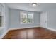 Comfortable bedroom with beautiful hardwood floors, neutral paint, and plenty of natural light at 2350 Kent Ave, North Charleston, SC 29405