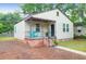 Charming single-story home featuring a cozy porch, a well-maintained yard, and traditional siding at 2350 Kent Ave, North Charleston, SC 29405