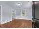 Bright living room with hardwood floors, neutral paint, and windows that provide ample natural light at 2350 Kent Ave, North Charleston, SC 29405