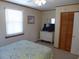 Bedroom with bright bedding, television, and convenient closet space at 2401 Palmetto Blvd, Edisto Island, SC 29438