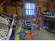 Ground level storage area full of yard equipment at 2401 Palmetto Blvd, Edisto Island, SC 29438
