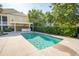Backyard oasis showcasing a sparkling pool next to the home, perfect for relaxation and outdoor enjoyment at 2449 Daniel Island Dr, Daniel Island, SC 29492