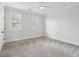 Light-filled bedroom with carpet, ceiling fan, and plantation shutters at 2449 Daniel Island Dr, Daniel Island, SC 29492