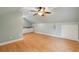 Bright bonus room featuring hardwood floors, recessed lights, wet bar with white cabinets and neutral decor at 2449 Daniel Island Dr, Daniel Island, SC 29492