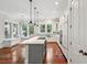 Open kitchen design featuring stainless appliances, large island, and ample natural light at 2449 Daniel Island Dr, Daniel Island, SC 29492