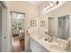 Bathroom with double sinks, large mirror, and decor at 26 Beachwood East, Isle of Palms, SC 29451