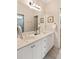Bathroom with double sinks, large mirror, and decor at 26 Beachwood East, Isle of Palms, SC 29451