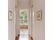Hallway view of the bathroom with a luxurious soaking tub at 26 Beachwood East, Isle of Palms, SC 29451