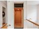 Convenient home elevator featuring wood paneling and ample space for easy access between floors, enhancing accessibility in the home at 26 Beachwood East, Isle of Palms, SC 29451