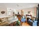 Open-concept living room with hardwood floors and ample seating at 26 Beachwood East, Isle of Palms, SC 29451