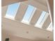 View of the ceiling skylights with a glimpse of the blue sky at 26 Beachwood East, Isle of Palms, SC 29451