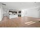 Spacious open-concept living space with wood floors and lots of natural light at 261 Celestial Blvd, Summerville, SC 29486