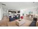 Bright, open living area blends a modern kitchen with a dining space for seamless entertaining at 261 Celestial Blvd, Summerville, SC 29486