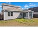 Well maintained home exterior featuring a screened porch and manicured lawn at 261 Celestial Blvd, Summerville, SC 29486