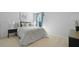 Cozy bedroom featuring a large comfortable bed and a modern bedside table at 288 Watersglen Dr, Summerville, SC 29486