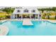 Community pool with lounge chairs and covered seating provides a resort-like experience for residents at 288 Watersglen Dr, Summerville, SC 29486