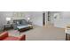 Comfortable living room with neutral carpeting and gray sofa at 288 Watersglen Dr, Summerville, SC 29486