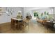 Open-concept living space featuring a dining area, a modern kitchen, and a cozy living room with stylish decor at 288 Watersglen Dr, Summerville, SC 29486