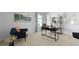 Comfortable home office featuring a desk, modern art, chair and a bright window at 288 Watersglen Dr, Summerville, SC 29486