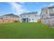 Wide backyard with a fenced perimeter, providing privacy and clear demarcation at 300 Saxony Loop, Summerville, SC 29486