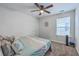 Bedroom with a ceiling fan, clock on the wall and one window that provides great natural light at 300 Saxony Loop, Summerville, SC 29486