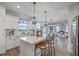 Open kitchen concept that overlooks the dining and living area, featuring an island and stainless steel appliances at 300 Saxony Loop, Summerville, SC 29486