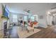 Comfortable living room features an open floor plan with a fireplace and abundant natural light at 300 Saxony Loop, Summerville, SC 29486