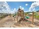 Community playground with slides, climbing structures, and a safe, wood-chip ground cover at 300 Saxony Loop, Summerville, SC 29486