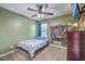 Bedroom with carpet, ceiling fan, and decorated with toys and a wall-mounted television at 3055 Nantuckett Ave, North Charleston, SC 29420
