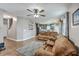 Inviting living room featuring hardwood floors, open floor plan and access to the dining area at 3055 Nantuckett Ave, North Charleston, SC 29420
