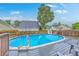 Above ground swimming pool with pool deck and view of the surrounding neighborhood at 3055 Nantuckett Ave, North Charleston, SC 29420