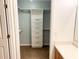 Walk-in closet with built-in shelving and drawers, offering ample storage solutions at 311 Dupont Way, Summerville, SC 29485