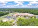 Aerial view of a sprawling campus featuring multiple buildings, green spaces, and a well-maintained parking lot at 315 Clubview Rd, Summerville, SC 29485