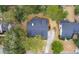 An aerial view of a single-Gathering home with a driveway and lush green trees surrounding it at 315 Clubview Rd, Summerville, SC 29485