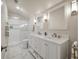 Modern bathroom with a dual sink vanity, shower, modern lighting, and tile flooring at 315 Clubview Rd, Summerville, SC 29485