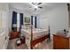 This bedroom features a bed, ceiling fan, window with curtains, and is brightly lit at 315 Clubview Rd, Summerville, SC 29485