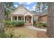 Welcoming front porch with white columns and charming curb appeal at 315 Clubview Rd, Summerville, SC 29485